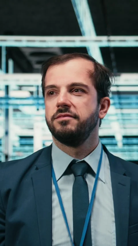 Vertical video Data center software developer removing VR goggles after Stockbeeldmateriaal 329450998