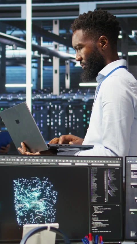 Vertical video Data center system administrator analyzing gear issues using node Video stock 307970173