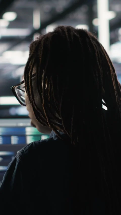 Vertical video Data center system administrator using node tree software to Video stock 307970891