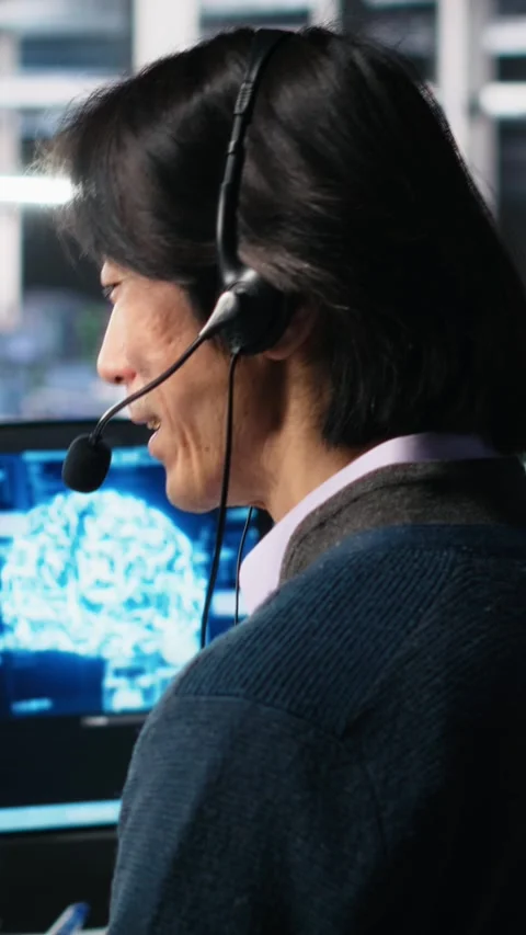 Vertical video Data center system administrator using AI assistant to provide Stock Footage 313507613