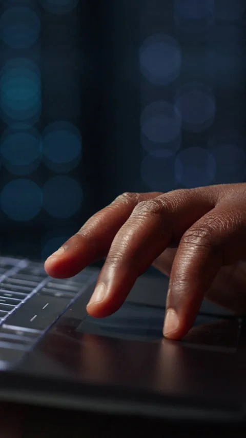 Vertical video Data center system administrator using laptop to ensure error Stock Footage 317055392