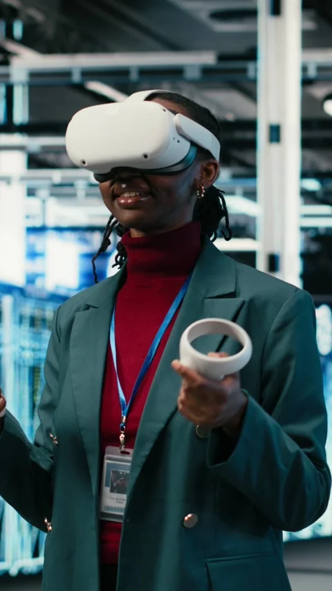 Vertical video Data center system administrator uses VR headset gear and AR Stock Footage 329590945