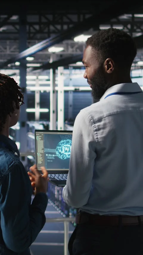 Vertical video Data center team on industrial platform using artificial Stock Footage 310780130