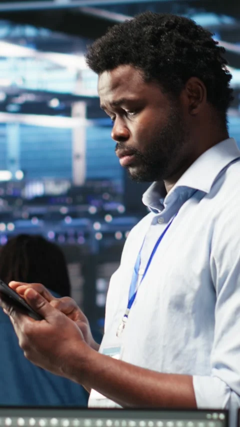 Vertical video Data center technician uses node tree programming to identify Stock Footage 307968838