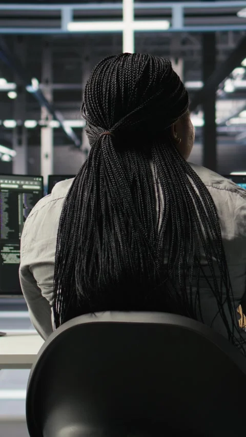 Vertical video Data center worker analyzes datasets using deep learning node Stock Footage 308755872