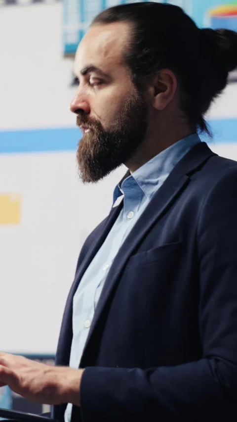 Vertical Video Data driven planning helps this professional to build a Stock Footage 310643295