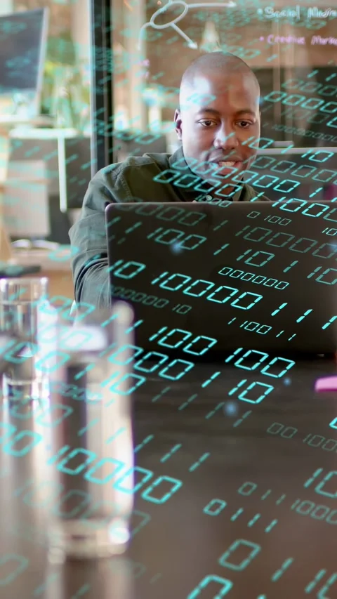 Vertical video: Data overlay appearing, dev leaning at laptop analyzing data and Stock Footage 335513819