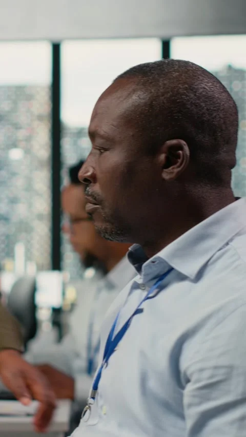 Vertical video Data scientists doing brainstorming in office, using AI Stock Footage 323330948