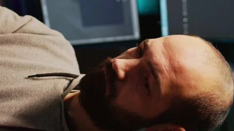 Vertical video: Database admin thinking about programming solution Stock Footage 221872500