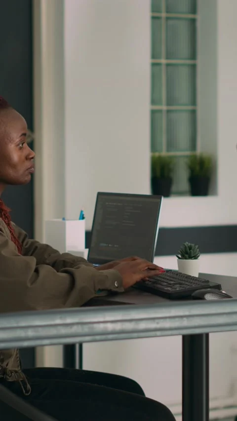 Vertical video: Database programer writing source code and script on terminal Stock Footage 218575846