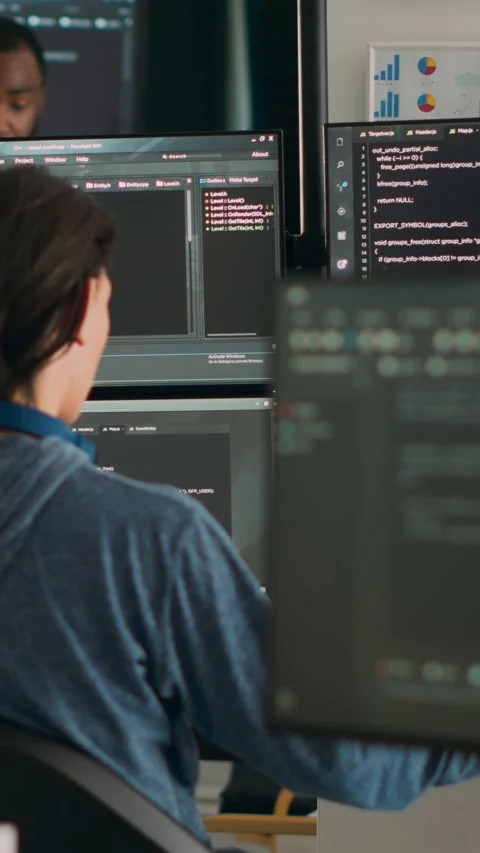 Vertical video: Database programer writing code on terminal window Stock Footage 218576913