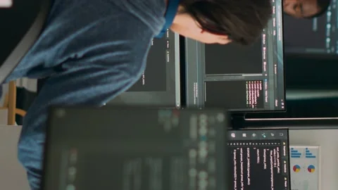 Vertical video: Database programer writing code on terminal window Stock Footage 219702288