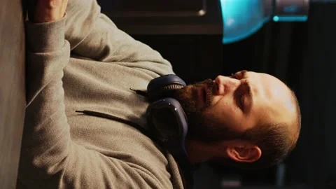 Vertical video: Database programer writing code and dealing with back pain Stock Footage 221797620