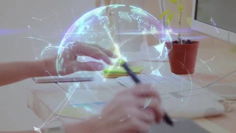 Vertical video: Designer drawing tablet, activating globe overlay, sorting notes Stock Footage 331404424