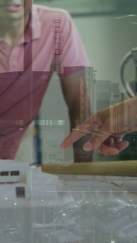 Vertical video: Designer leaning over model peer passing pen aligning parts for Vídeo Stock 334600534
