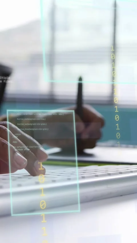 Vertical video: Designer starting editing with stylus on tablet while typing, Stock Footage 334694953