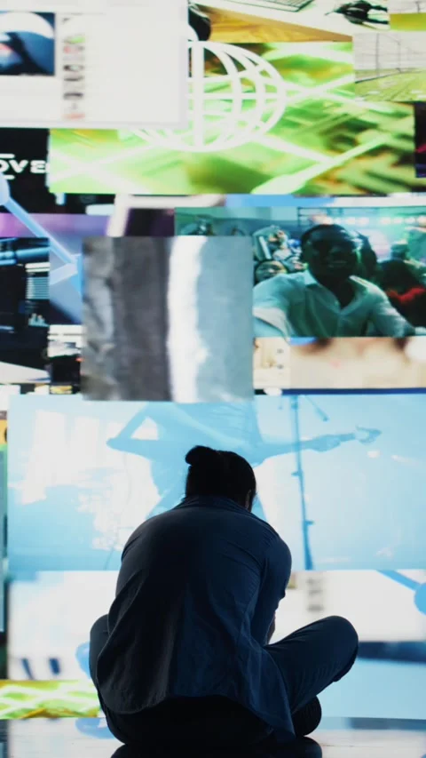 Vertical Video Desperate guy staring at phone screen in misery symbolizing toxic Vídeo Stock 310915429