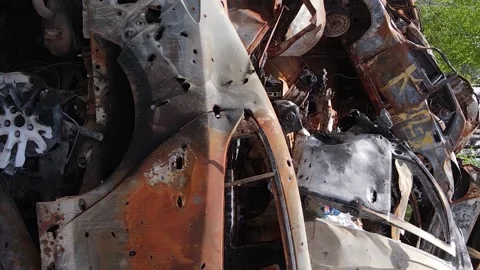 Vertical video of destroyed and shot cars in the city of Irpin, Ukraine Stock Footage 193720748