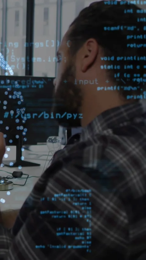 Vertical video: Dev holding device, activating code overlay growing denser, Stock Footage 334544342