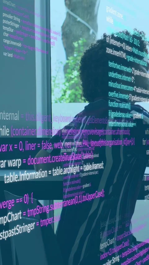 Vertical video: Dev shifting at window while code overlay scrolling across torso Stock Footage 333577498