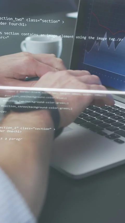 Vertical video: Dev typing at desk, key tap causing code overlays and cube while Stock Footage 334836925
