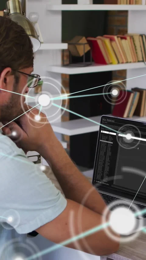 Vertical video: Dev working at laptop, HUD appearing, growing into network Stock Footage 329841018
