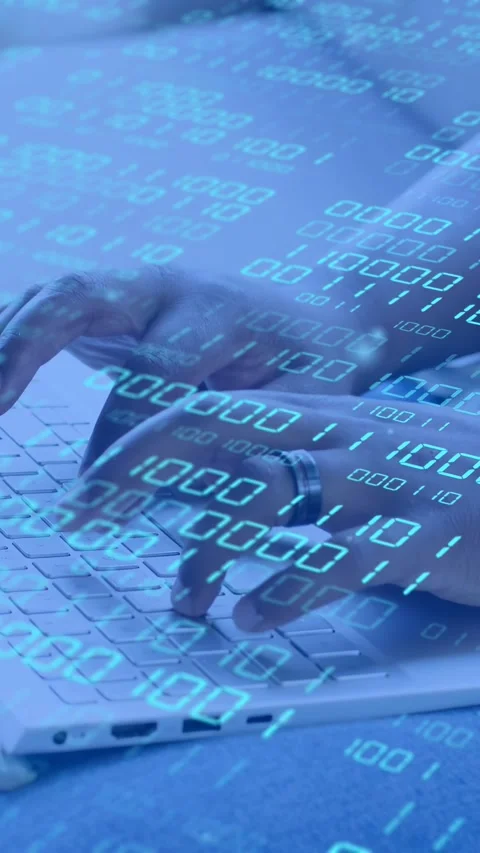 Vertical video: Developer coding on laptop, fingers initiating typing, blue Stock Footage 334770943