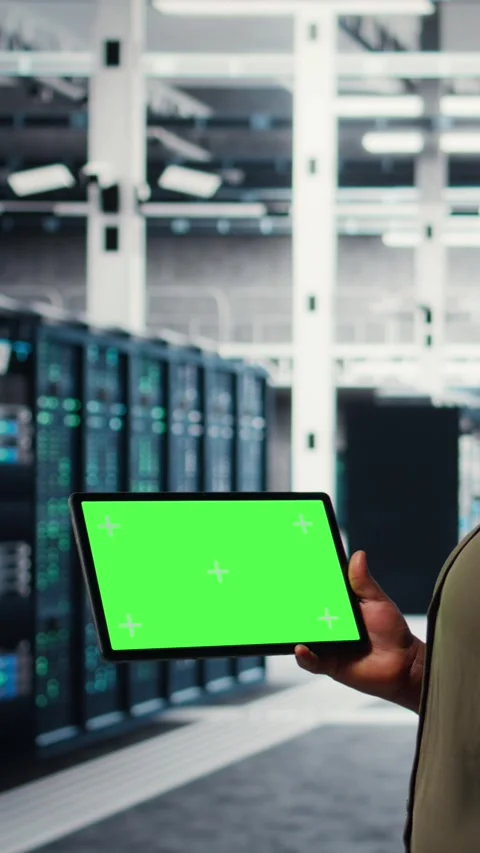 Vertical video Developer in data center using isolated screen tablet to upgrade Video stock 317054019
