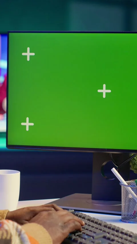 Vertical Video Developer enters binary data on terminal panel next to isolated Stock Footage 319556592