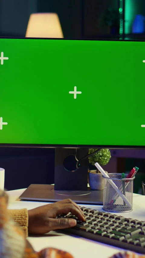 Vertical Video Developer enters binary data on terminal panel next to isolated Stock Footage 319568394