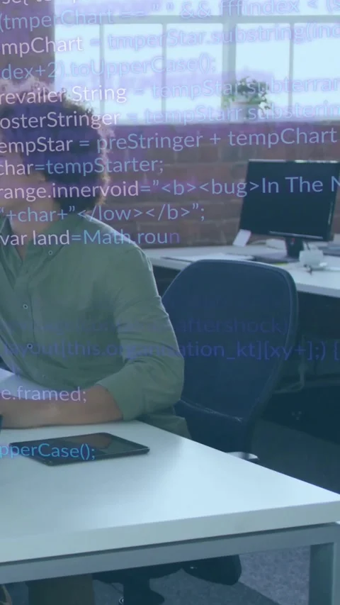 Vertical video: Developer glancing left at alert, leaning and typing as code Stock Footage 331166967