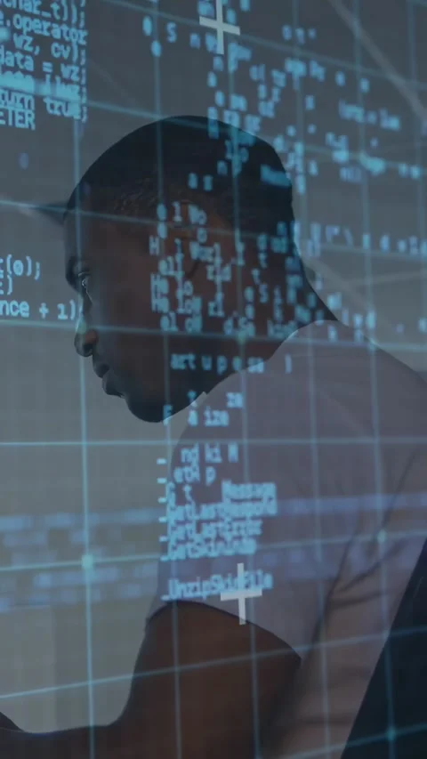 Vertical video: Developer leaning at desk watching code grid overlay shifting Stock Footage 331238743