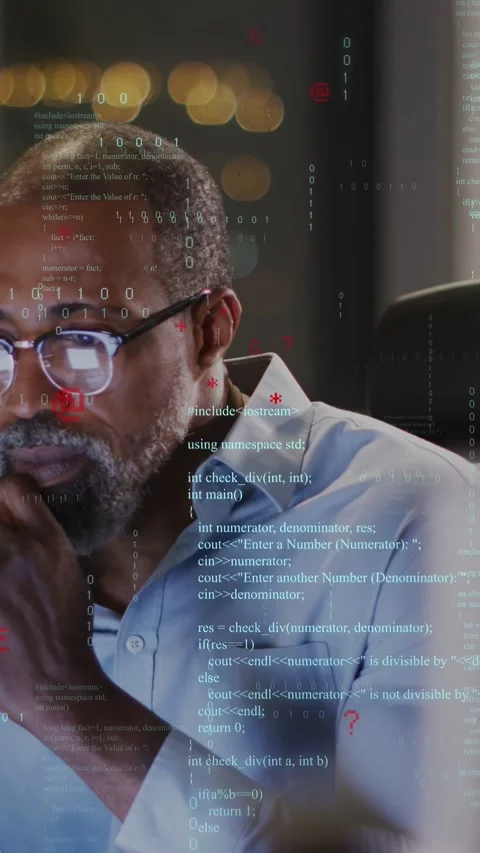 Vertical video: Developer leaning forward, adjusting glasses with code overlay Stock Footage 335355239