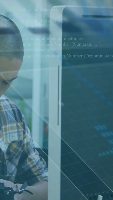 Vertical video: Developer looking down, reaching for device, tweaking while Stock Footage 334601247
