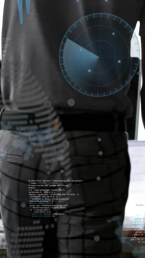 Vertical video: Developer lowering phone tapping tablet typing at desk while HUD Stock Footage 331404988