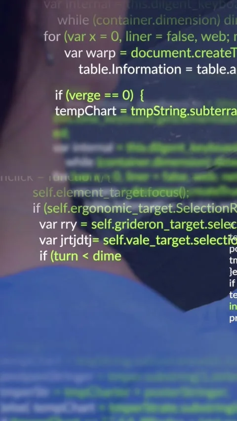 Vertical video: Developer running build and watching scrolling code overlaying Stock Footage 331738727