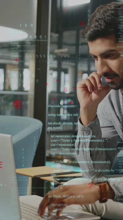 Vertical video: Developer typing on laptop, showing code overlay while answering 스톡 동영상 335355233