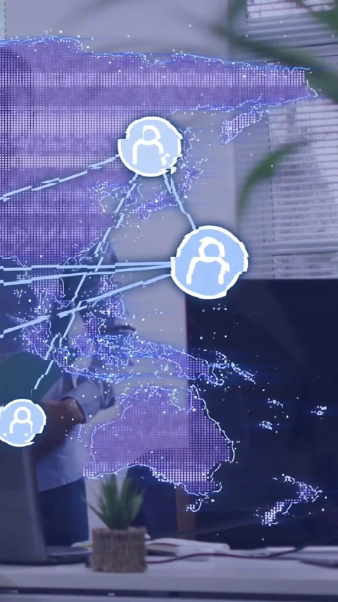 Vertical video: On device tap hologram map updating over desk nodes pulsing to Stock Footage 334387125