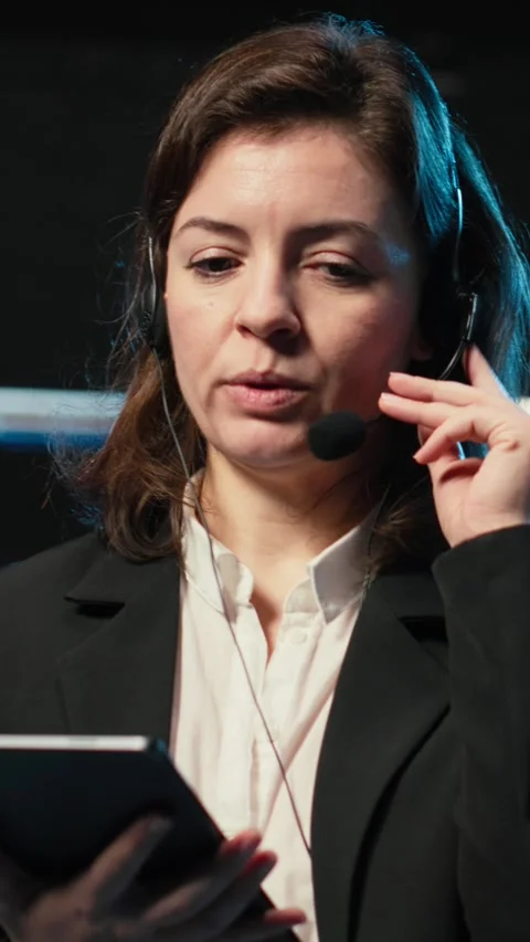 Vertical video Diagnosing tech issues, AR holographic IT support worker in data Stock Footage 329320088