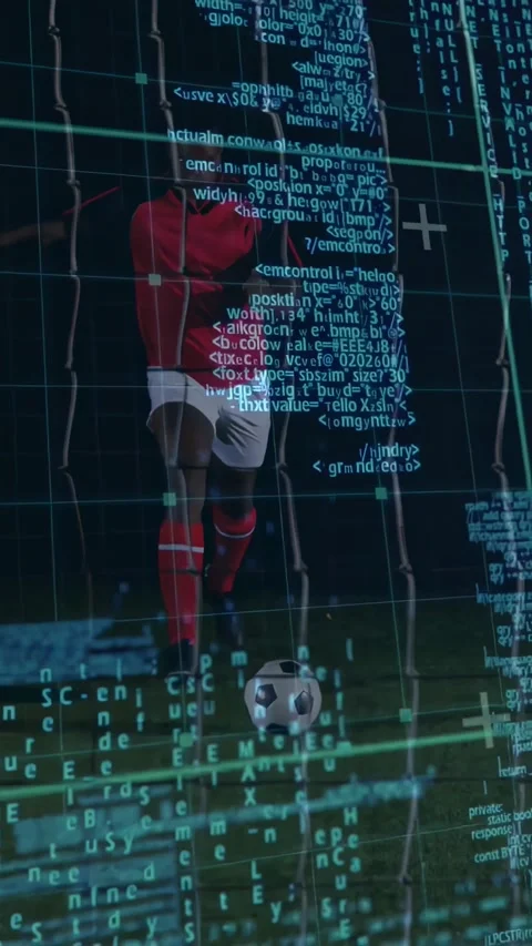 Vertical video: Digital code overlay appearing, player running up and kicking Stock Footage 331077340