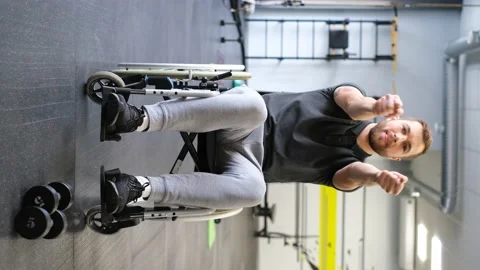 Vertical video, a disabled person is training in a rehabilitation center Stock Footage 222644082