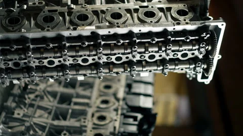 Vertical video Disassembled engine block on table the mechanic opened the Video stock 274258408