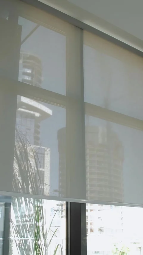 Vertical video. Discover the charm of modern window blinds that beautifully Stock Footage 303858175