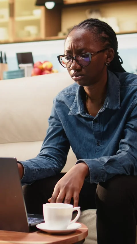 Vertical Video Disoriented woman being preoccupied with task apprehension at Stock-Footage 344528908