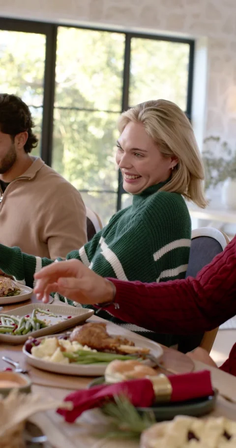 Vertical video: Diverse friends, blonde woman raising glass, initiating toast Видео 346735313