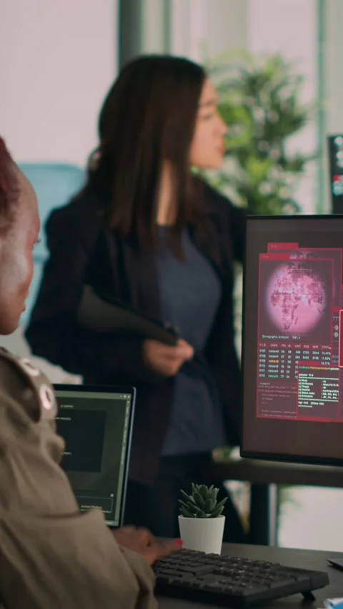 Vertical video: Diverse team of database admins having hacked server and Stock Footage 218576305