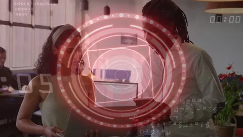 Vertical video: Diverse team holding laptop man with phone at work HUD pulsing Stock Footage 332666907