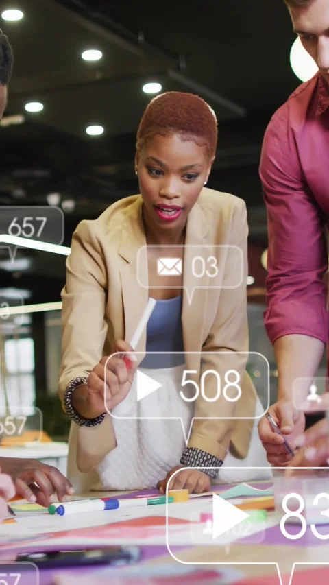 Vertical video: Diverse team lead in blazer pointing pen at table refining 스톡 동영상 332381793