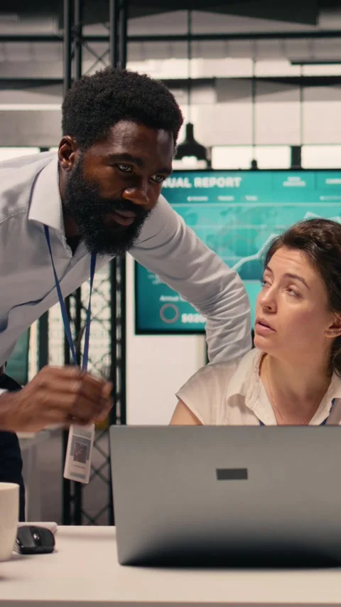 Vertical Video Diverse work team in a multinational company office discussing Stock Footage 329321873