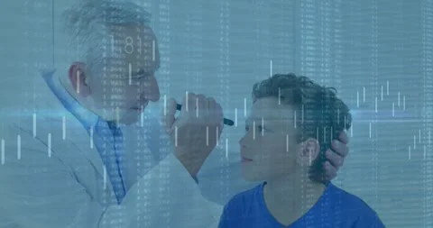 Vertical video: Doctor lifting light holding boy testing pupils with medical HUD Stock Footage 331227486